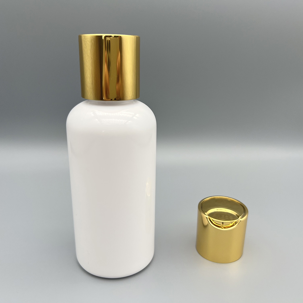 24/410 UV gold disc top cap/press cap